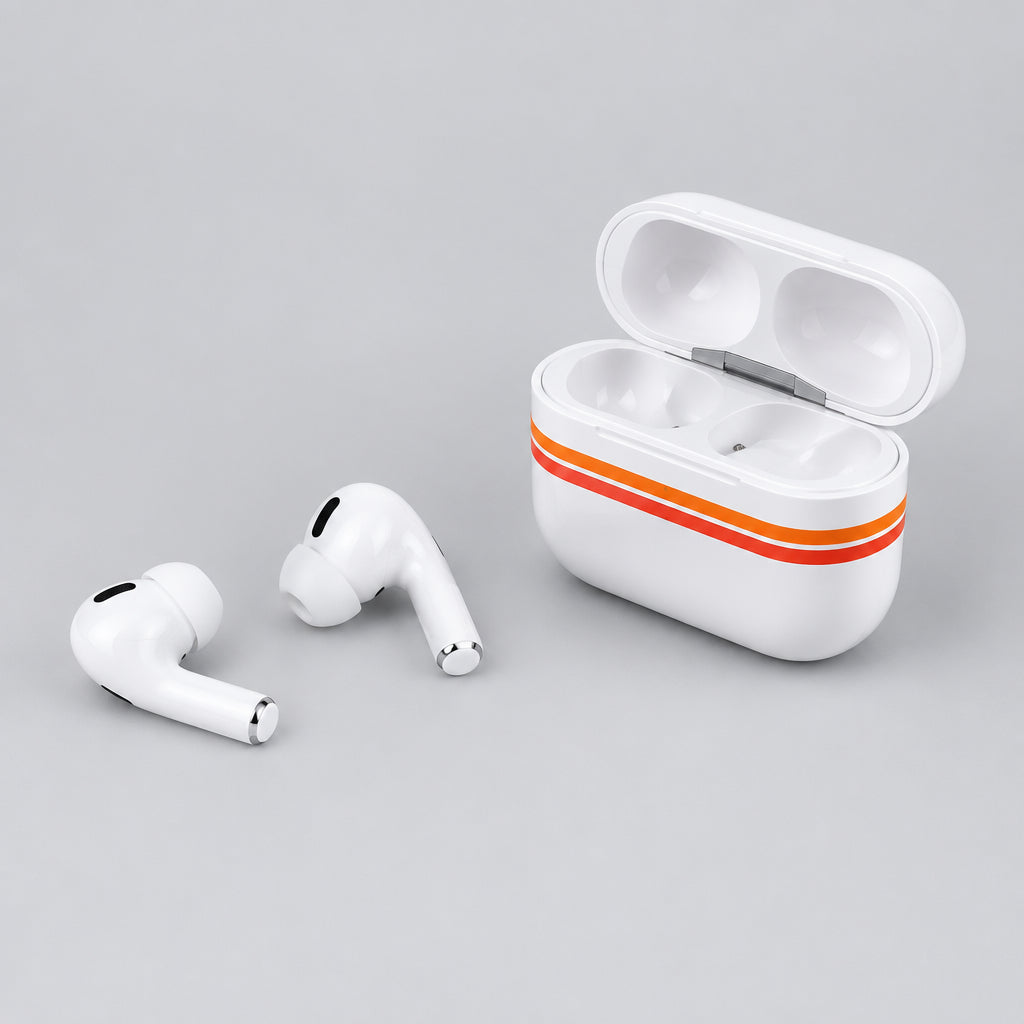 White wireless earbuds with a matching white charging case featuring orange stripes, displayed on a light gray surface.