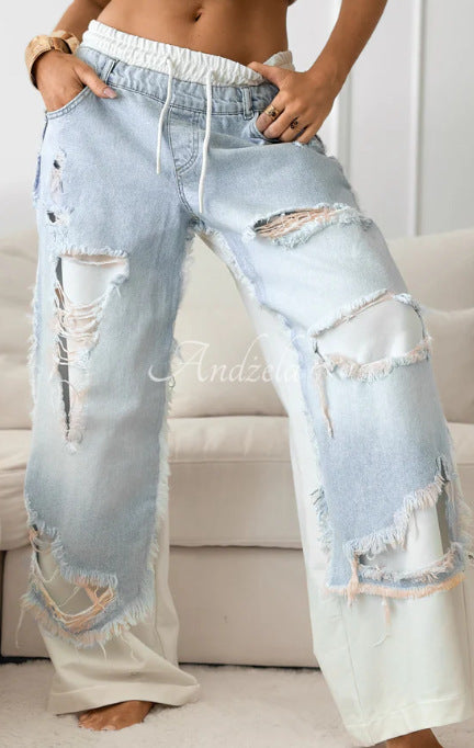 Distressed Lace-Up Jeans