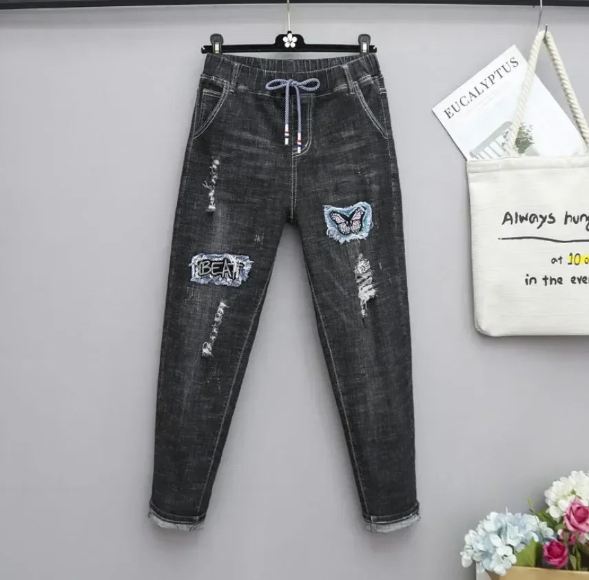 Women's Plus-Size Elastic-Waist Ripped Jeans — product view