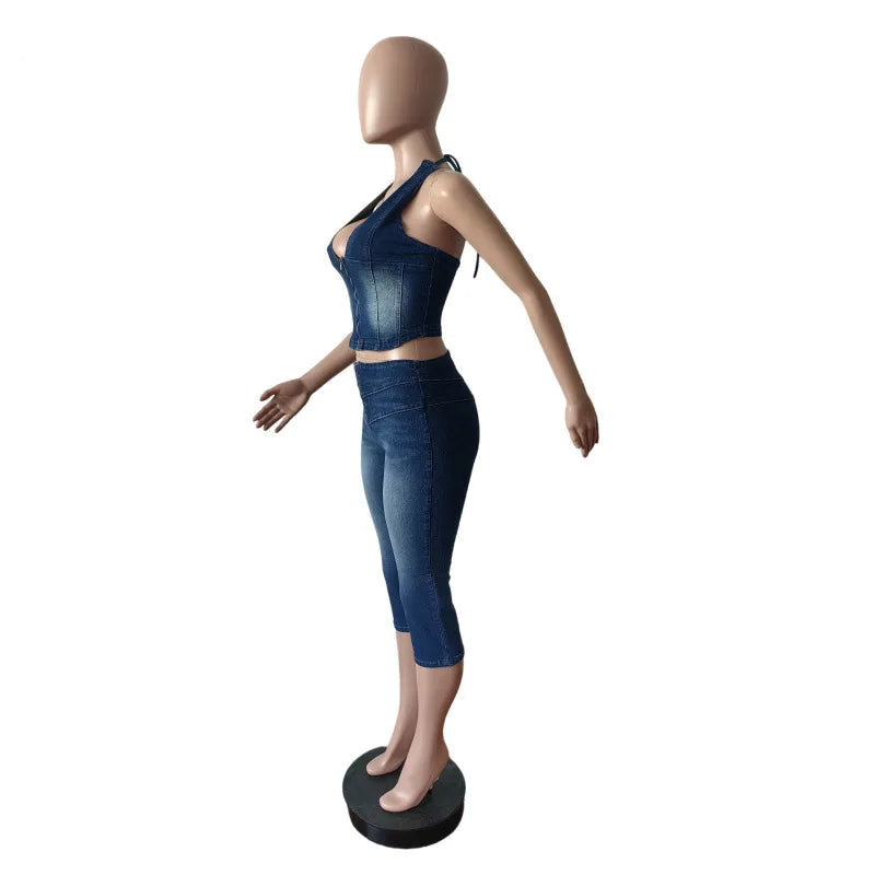 Mannequin wearing a blue denim outfit with 'CM.YAYA' branding.
