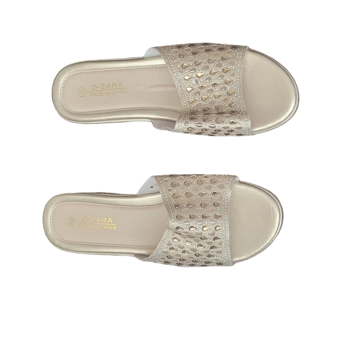 A pair of women's slide sandals with woven beige straps and a light beige footbed, shown from a top-down view on a dark wood floor.