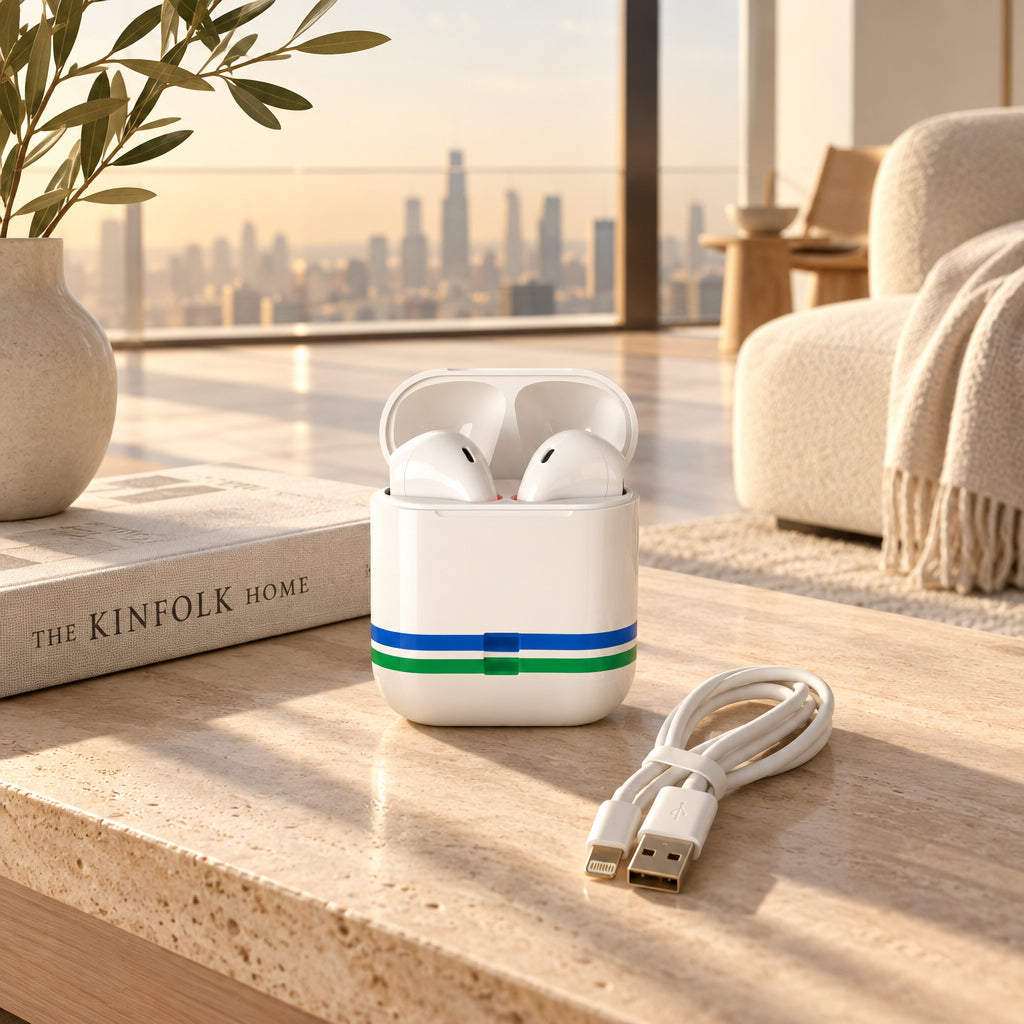White wireless earbuds in an open charging case with green and blue accent stripes, shown with a USB cable and printed instruction booklet in its retail box.