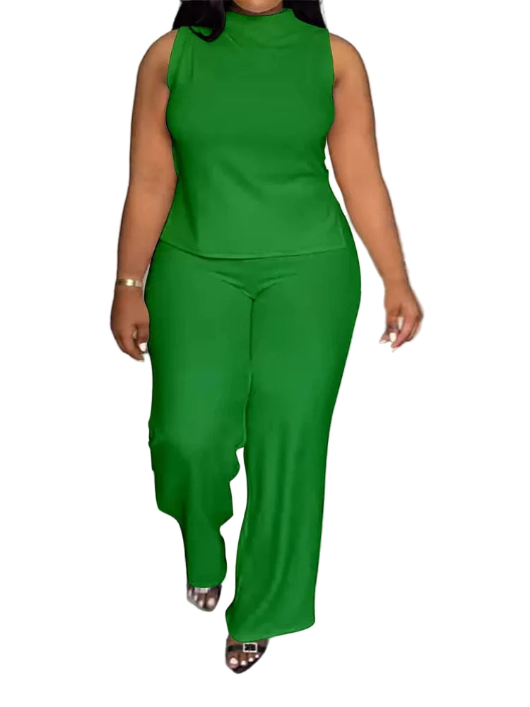 Person wearing a green outfit standing on a tiled floor.